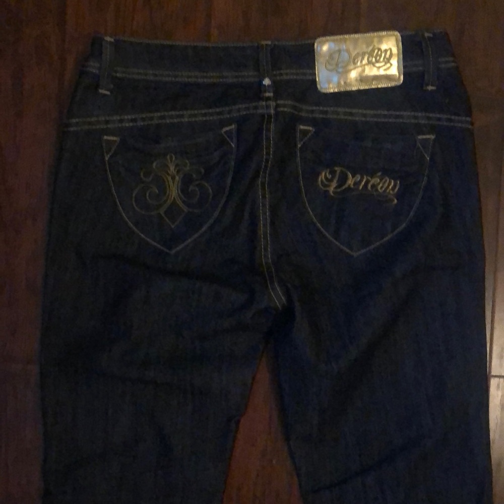 Doreon Brand jean, 7-8 size. Dark blue denim never used. 42” length. Flared leg